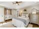 Spacious bedroom with a crib and dresser at 571 Glen Eagles Se Cir, Marietta, GA 30067