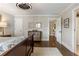 Elegant bedroom with hardwood floors and ensuite access at 571 Glen Eagles Se Cir, Marietta, GA 30067