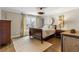 Serene bedroom with hardwood floors and neutral tones at 571 Glen Eagles Se Cir, Marietta, GA 30067