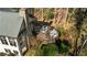 Spacious deck with built-in seating and firepit, overlooking wooded area at 571 Glen Eagles Se Cir, Marietta, GA 30067