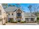Elegant home with a white brick facade and black shutters at 571 Glen Eagles Se Cir, Marietta, GA 30067