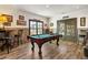 Basement game room with pool table and access to patio at 571 Glen Eagles Se Cir, Marietta, GA 30067