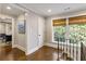 Bright hallway with hardwood floors and access to other rooms at 571 Glen Eagles Se Cir, Marietta, GA 30067