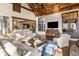 Sunlit living area featuring a comfortable sectional sofa and hardwood floors at 571 Glen Eagles Se Cir, Marietta, GA 30067