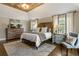 Main bedroom with wooden ceiling and fireplace at 571 Glen Eagles Se Cir, Marietta, GA 30067