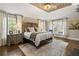 Large main bedroom with a rustic wooden bed frame and wood ceiling at 571 Glen Eagles Se Cir, Marietta, GA 30067