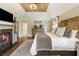 Main bedroom with fireplace and built-in shelving at 571 Glen Eagles Se Cir, Marietta, GA 30067