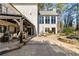 Covered patio with seating and outdoor kitchen at 571 Glen Eagles Se Cir, Marietta, GA 30067