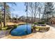 Freeform pool with spa and putting green views at 571 Glen Eagles Se Cir, Marietta, GA 30067