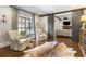 Cozy sitting area with a cowhide rug and comfortable armchairs at 571 Glen Eagles Se Cir, Marietta, GA 30067