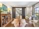 Relaxing sitting area with a view to the entryway and staircase at 571 Glen Eagles Se Cir, Marietta, GA 30067