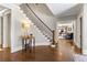 Elegant curved staircase with wrought iron railing at 571 Glen Eagles Se Cir, Marietta, GA 30067