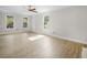 Spacious living room with hardwood floors and lots of natural light at 6894 Kerrie Way, Lithonia, GA 30058