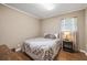 Bedroom with hardwood floors and a ceiling fan at 156 Main St, Lilburn, GA 30047