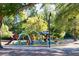 Colorful playground with slides and climbing structures for  at 156 Main St, Lilburn, GA 30047