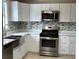 Updated kitchen with stainless steel appliances at 175 Brown Rd, Stockbridge, GA 30281