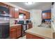 Modern kitchen with stainless steel appliances at 177 Oakland Hills Way, Lawrenceville, GA 30044