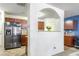 Functional Kitchen with wooden cabinets and modern appliances adjacent to kitchen area at 177 Oakland Hills Way, Lawrenceville, GA 30044