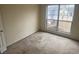 Bedroom with carpet, large window, and natural light creates a cozy and inviting atmosphere at 2800 Camelot Woods Dr, Lawrenceville, GA 30044