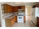 Traditional kitchen design with a view to the next room at 2800 Camelot Woods Dr, Lawrenceville, GA 30044