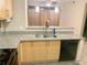 Modern kitchen with granite countertops and a breakfast bar at 390 17Th Street # 2002, Atlanta, GA 30363