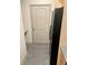 Laundry closet with washer, dryer, and overhead shelving at 390 17Th Street # 2002, Atlanta, GA 30363