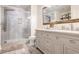 Elegant bathroom with double vanity and walk-in shower at 565 Peachtree Ne St # 1303, Atlanta, GA 30308