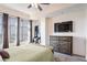 Bright bedroom with a large bed and plenty of light at 565 Peachtree Ne St # 1303, Atlanta, GA 30308