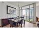 Modern dining room with city views and a spacious layout at 565 Peachtree Ne St # 1303, Atlanta, GA 30308