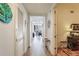 Bright and spacious hallway leading to living areas at 565 Peachtree Ne St # 1303, Atlanta, GA 30308