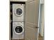 Stackable washer and dryer in a convenient closet at 565 Peachtree Ne St # 1303, Atlanta, GA 30308