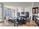 Bright living room with hardwood floors and city views at 565 Peachtree Ne St # 1303, Atlanta, GA 30308