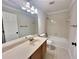 Clean bathroom with tub, toilet and vanity at 713 Cypress Pointe St, Alpharetta, GA 30022