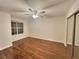 Bright bedroom with wood floors and ceiling fan at 713 Cypress Pointe St, Alpharetta, GA 30022