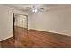 Bright bedroom with wood floors and mirrored closet doors at 713 Cypress Pointe St, Alpharetta, GA 30022