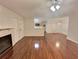 Open concept living room and kitchen with hardwood floors at 713 Cypress Pointe St, Alpharetta, GA 30022