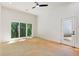 Unfinished basement room with sliding glass doors leading to the backyard at 977 Fleetwood Cir, Atlanta, GA 30311