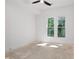 Unfinished bedroom with hardwood floors and two large windows at 977 Fleetwood Cir, Atlanta, GA 30311