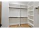 Large walk-in closet with ample shelving and hanging space at 977 Fleetwood Cir, Atlanta, GA 30311