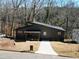 Modern home with front yard and driveway at 977 Fleetwood Cir, Atlanta, GA 30311