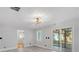 Bright living room featuring hardwood floors and sliding glass doors leading to a screened porch at 1097 Dell Se Ave, Smyrna, GA 30080