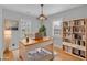 Home office with built-in shelving and hardwood floors at 1097 Dell Se Ave, Smyrna, GA 30080