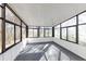 Sunroom with gray carpet and many windows at 1450 Tudor Pl, Grayson, GA 30017