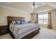 Large bedroom with a king-size bed and plenty of natural light at 1653 Perserverence Hill Nw Cir # 10, Kennesaw, GA 30152