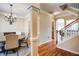 Elegant dining room with hardwood floors and chandelier at 1653 Perserverence Hill Nw Cir # 10, Kennesaw, GA 30152