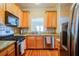 Kitchen with granite countertops and stainless steel appliances at 1653 Perserverence Hill Nw Cir # 10, Kennesaw, GA 30152