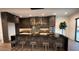 Spacious kitchen with modern lighting, sleek cabinetry, and a large island at 6711 Bishop Rd, Fairburn, GA 30213