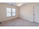 Bright bedroom with neutral walls and carpet at 1630 Victoria Chase, Cumming, GA 30041