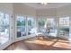 Breakfast nook with hardwood floors and large windows at 1630 Victoria Chase, Cumming, GA 30041