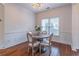 Round table with four chairs in a bright dining room at 1630 Victoria Chase, Cumming, GA 30041